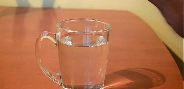  Cumming into glass of water